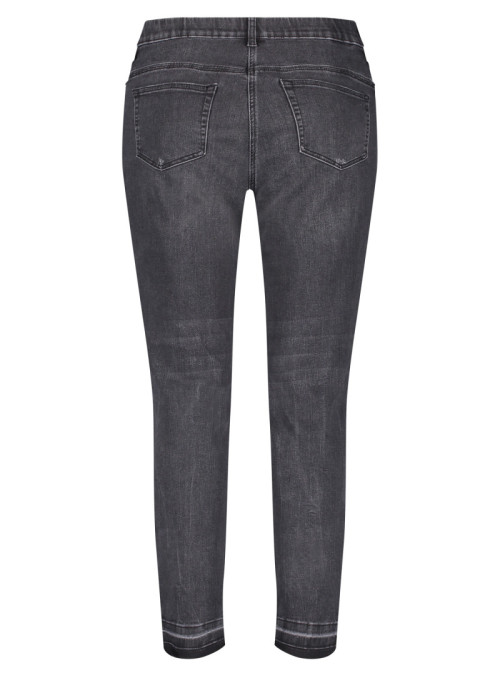 Jeans avec ourlet effiloché...